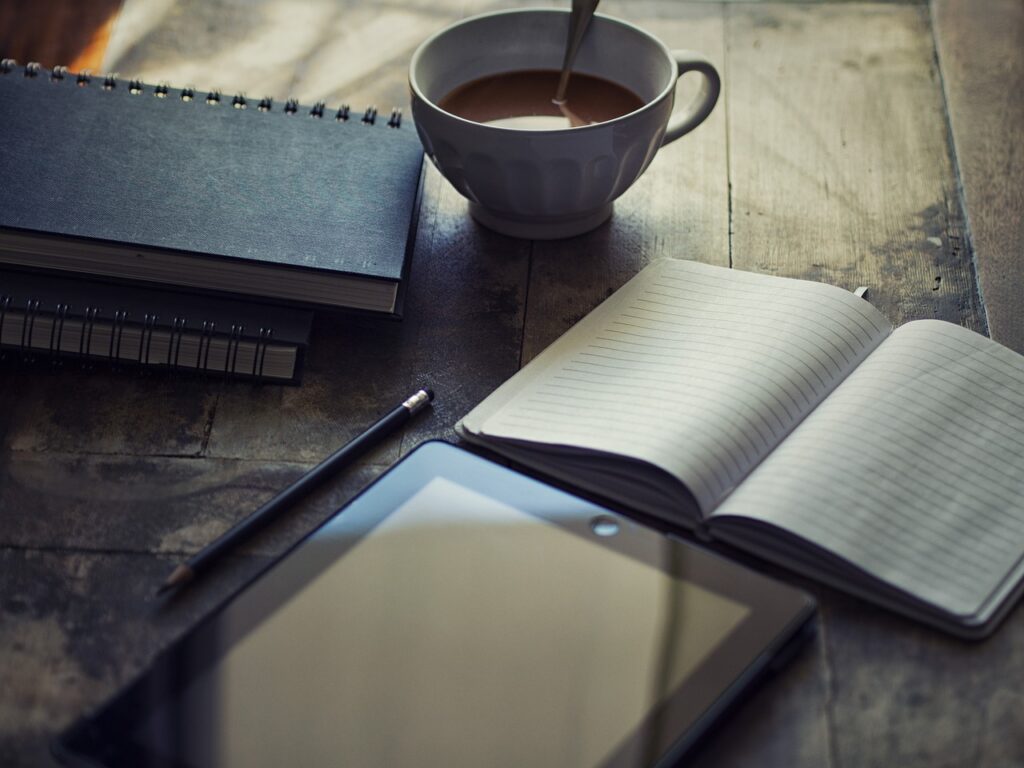 How to Make Money Through Sponsored Content On A Blog 1 diary, ipad, write