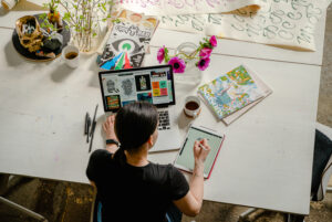 Can I Start An Online Business With Little Or No Money? 1 woman working on Online Business